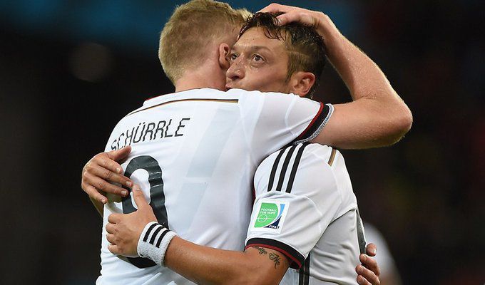 Germany's- midfielder- Mesut- Ozil- celebrates-metafootball.jpg