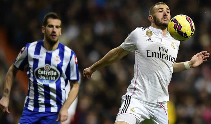Alberto Lopo of RC Deportivo La Coruña in action with Karim Benzema (R) of Real Madrid CF during their Spanish Liga match.jpg