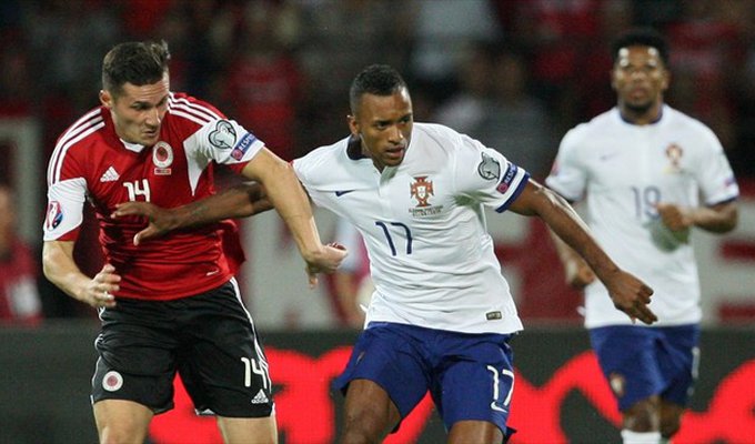 ant Xhaka of Albania in action with Nani (R) of Portugal during their UEFA EURO 2016.jpg