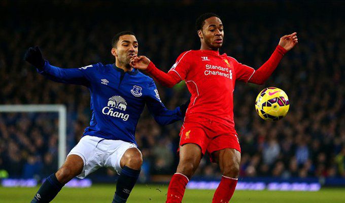 Aaron Lennon of Everton FC in action with Raheem Sterling (R) of Liverpool FC during their English Premier League match.jpg