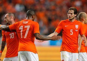 لنس|شادمانی بازیکنان هلند بعد از باز کردن دروازه ولز.