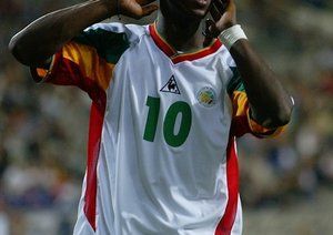 جام جهانی 2002|سئول، 31 می: خالیلو فادیجا از سنگال حین دیدار برابر فرانسه از بازی های گروه A جام جهانی، مرحله ی گروهی جام جهانی، ورزشگاه جام جهانی سئول، سئول، کره جنوبی، 31 می  2002، سنگال با حساب 1-0 به پیروزی رسید.