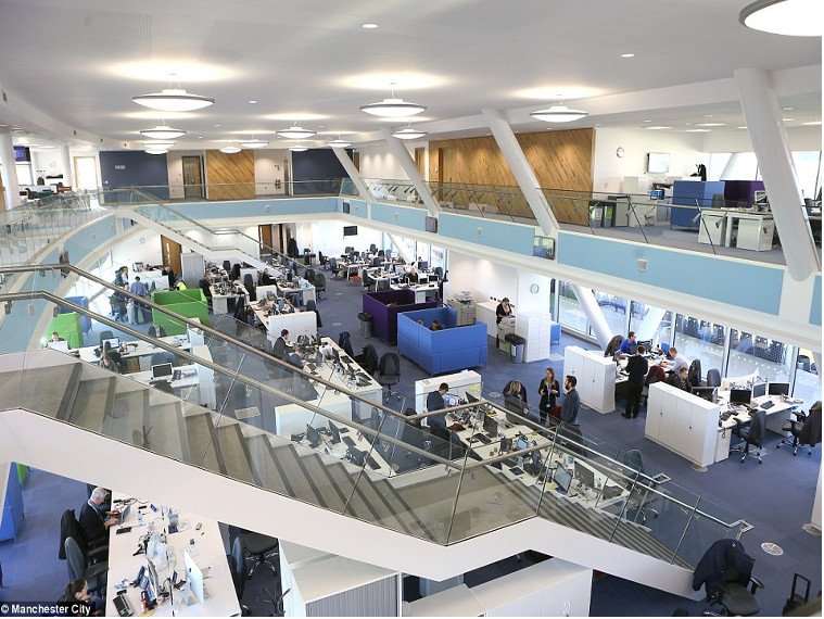 23DF81AD00000578-2862372-A_view_of_the_open_plan_headquarters_of_the_City_Football_Academ-a-79_1418035810242.jpg