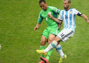 ماسکرانو - اودموینگی|تقابل ماسکرانو ، بازیکن آرژانتین با اودموینگی از نیجریه.