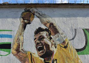 جام جهانی برزیل ۲۰۱۴|دیوارهای فرودگاه شهر سائوپائلو برزیل تم ورزشی به خود گرفت