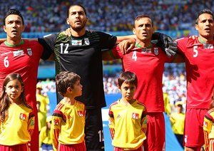 جواد نکونام-علی‌ رضا حقیقی‌-صادقی|بازیکنان تیم ملی کشورمان در حال خوندن سرود ملی .