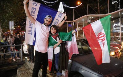 عکس/ خوشحالی هواداران پس از برد ایران در خیابان‌های تهران